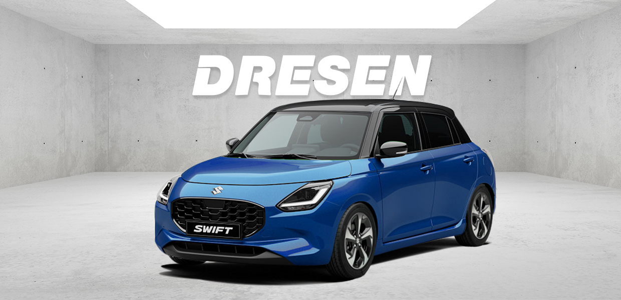 Blauer Suzuki Swift vor Betonwand mit großem ‚DRESEN‘-Schriftzug darüber.
