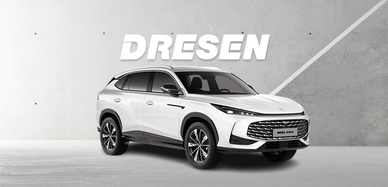 Weißer MG HS vor Betonwand mit großem ‚DRESEN‘-Schriftzug darüber.