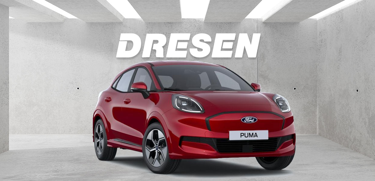 Roter Ford Puma Gen-E vor Betonwand mit großem ‚DRESEN‘-Schriftzug darüber.